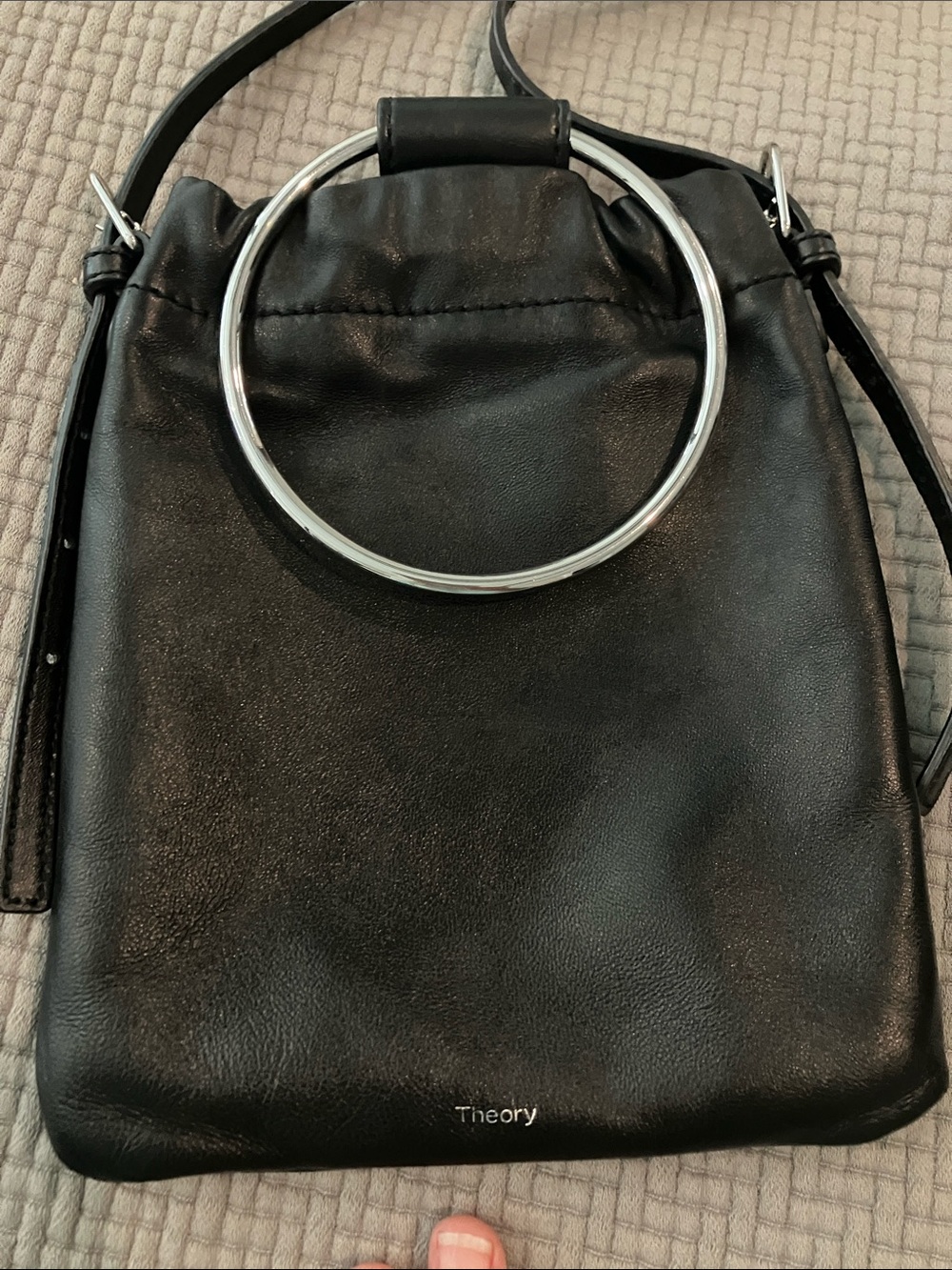 Theory Black Leather Crossbody with Silver Ring Accent.